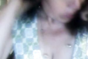 This aged brunette hair woman doesn't know what to do on web camera