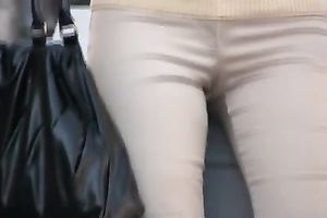 Lena pees her panties and changes her raiment on the stairway