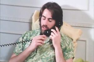 Curly-haired retro skank demonstrates her worthwhile fellatio skills