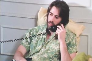 Curly-haired retro skank demonstrates her worthwhile fellatio skills