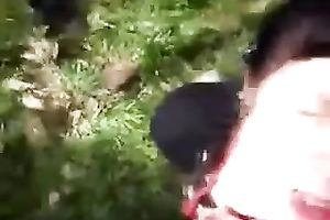 Outdoor POV with a brunette hair hussy engulfing my knob in a park