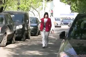 Tanya soaks her trousers in the street and changes her clothing