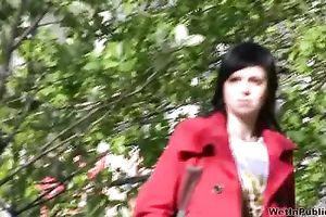 Tanya soaks her trousers in the street and changes her clothing