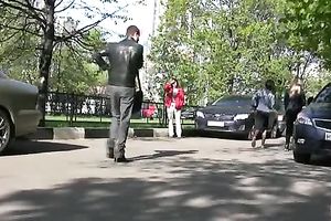 Tanya soaks her trousers in the street and changes her clothing