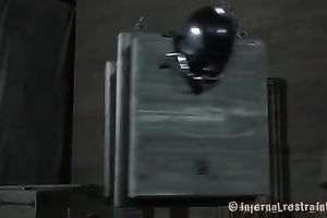 Brunette playgirl with mask on her head is tortured by her dominant with sex toys