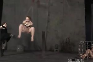 Bounded redhead babe with great skinny body is suspended and punished