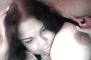 Cute black skin dark brown playgirl shows off her heavy boobies