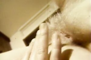 Sex hungry dark brown babe fingerfucks her curly kitty ardently