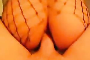 Slutty whore in bodystocking rides me in reverse cowgirl position