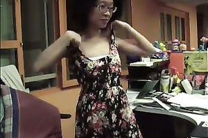 Petite Asian office girl undresses and demonstrates her body