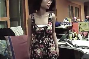 Petite Asian office girl undresses and demonstrates her body