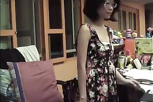 Petite Asian office girl undresses and demonstrates her body