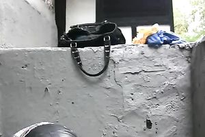 Kate makes a puddle in the street and changes her garments