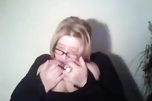 Mature golden-haired fattie plays with her mambos and slit in front of a web camera