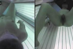 My playful girlfriend enjoys masturbating in solarium