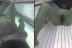 My playful girlfriend enjoys masturbating in solarium