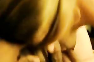 My nice-looking golden-haired playgirl strokes my BBC with her throat and boobs