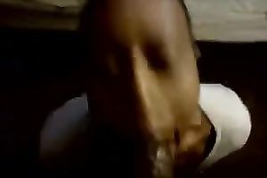 My fleshly ebon GF tries her superlatively good to acquire her face hole filled with cum