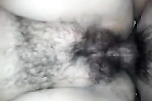 Drilling older bitch's hairy cookie in the missionary pose