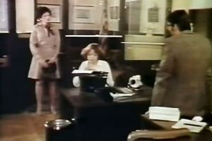 Seductive dark brown in a golden outfit puts on a show.