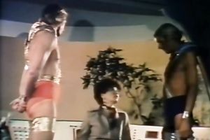 Seductive dark brown in a golden outfit puts on a show.