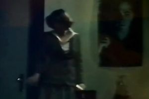 Seductive dark brown in a golden outfit puts on a show.