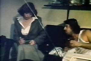 Seductive dark brown in a golden outfit puts on a show.