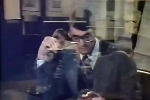 Seductive dark brown in a golden outfit puts on a show.