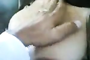 Pretty Indian babe lets her paramour caress her large milk cans