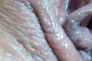 Horny legal age teenager with well-developed whoppers gives a close up view of her fur pie
