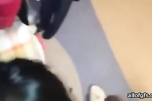 Four eyed Asian gal sucks her fuck buddy's 10-Pounder gently until this babe gets a facial