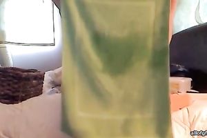 Super lewd redhead tickles her muff with her a fake penis