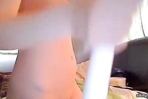 Super lewd redhead tickles her muff with her a fake penis