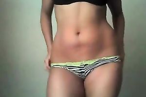 Appetizing tanned skin body of a sexy dark brown sporty legal age teenager