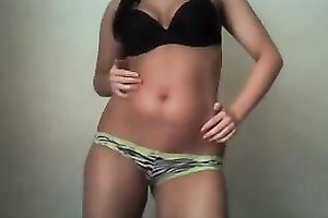 Appetizing tanned skin body of a sexy dark brown sporty legal age teenager