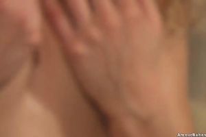 Carol shows her fine wazoo and fingers her hairless vagina