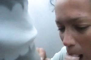 Pretty dark brown slut gives good blow job to her guy