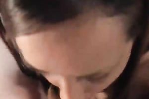 This slutty nympho takes her time engulfing her lover's meat stick