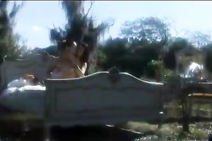 Two lusty doxies fuck one excited guy outdoors in trio