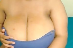 This swarthy webcam wench with huge knockers puts on a show for me