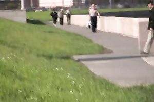 Sensual golden-haired Olga pees her panties on the embankment