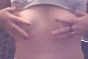 Skinny white floozy plays with her miniature breasts and her soaked vagina