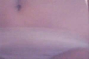 Skinny white floozy plays with her miniature breasts and her soaked vagina