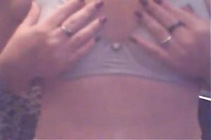 Skinny white floozy plays with her miniature breasts and her soaked vagina