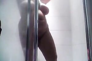 My voluptuous white bitch with huge milk cans puts on a great shower show