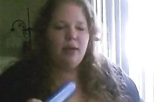 Charming big beautiful woman deepthroats a sex toy in a sexy intimate web camera show