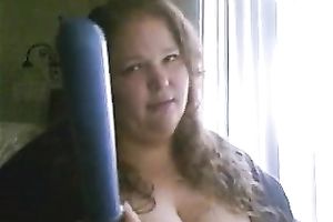 Charming big beautiful woman deepthroats a sex toy in a sexy intimate web camera show