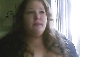 Charming big beautiful woman deepthroats a sex toy in a sexy intimate web camera show