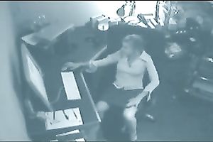 Hidden cam catches a secretary masturbating in an office