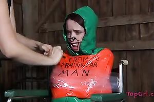 Lascivious nympho is placed into a wheeled restraint chair